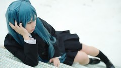 Woman cosplay vocaloid hatsune