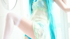Woman cosplay vocaloid hatsune