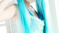 Woman cosplay vocaloid hatsune