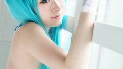 Woman cosplay vocaloid hatsune