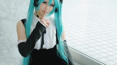 Woman cosplay vocaloid hatsune