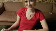 Woman couch smiling Dido (singer)