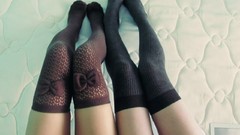 Woman couple bows legs stockings black stockings body parts