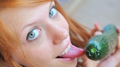 Woman cucumbers blue eyes licking Pepper Kester