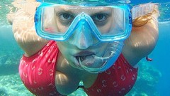 Woman diving blondes bikini boobs