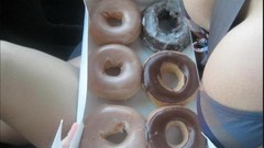 Woman donuts cleavage doughnuts