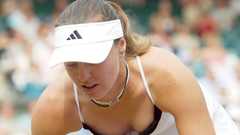 Woman downblouse Martina Hingis