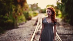Woman dress blue eyes freckles redheads cleavage railroad 
