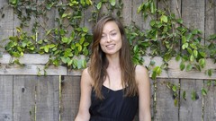 Woman dress Celebrity Olivia Wilde Actress outdoors smiling 