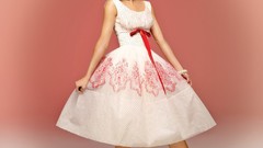 Woman dress Celebrity Selena Gomez earrings bracelets smiling 