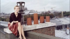 Woman dress Diane Kruger sitting red dress rooftops
