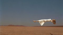 Woman dress white dress levitation Heather Graham