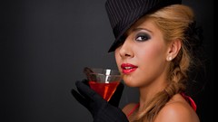 Woman drinks blondes fedoras