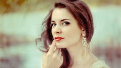 Woman earrings lipstick long hair models