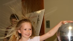 Woman electricity physics smiling