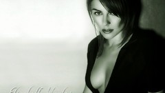 Woman Elizabeth Hurley models cleavage