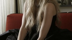 Woman emo Avril Lavigne stockings blondes black dress eyeliner 