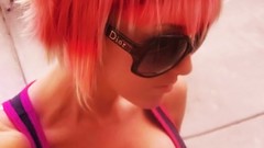 Woman emo sunglasses orange hair
