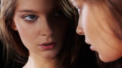 Woman eyes Met-Art magazine