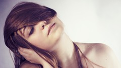 Woman faces artistic depth of field