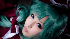 Woman faces asians blue eyes green hair cosplay