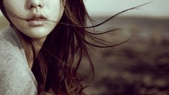 Woman faces asians brunettes hair in face