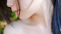 Woman faces asians brunettes hair in face