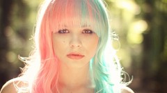 Woman faces bangs colored hair