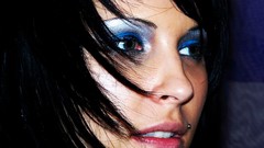 Woman faces black hair pierced lips