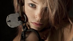Woman faces blondes blue eyes chained