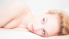 Woman faces blondes no bra topless