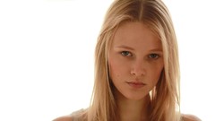 Woman faces blondes teen