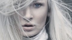 Woman faces blue eyes