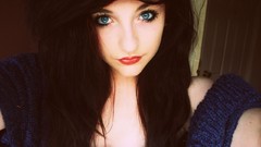 Woman faces blue eyes