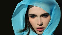 Woman faces blue eyes