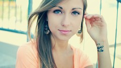 Woman faces blue eyes