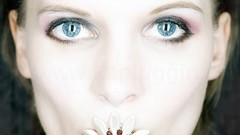 Woman faces blue eyes