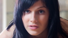 Woman faces blue eyes brunettes black hair