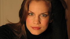 Woman faces blue eyes brunettes hands on head Anna Chlumsky