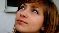 Woman faces blue eyes brunettes looking up