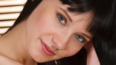 Woman faces blue eyes models black hair Met-Art magazine Angel E