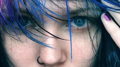Woman faces blue hair blue eyes piercings pierced nose