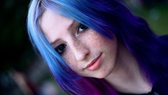 Woman faces blue hair freckles
