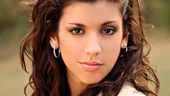 Woman faces brown eyes