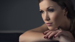 Woman faces brunettes nail polish