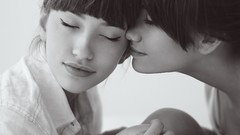 Woman faces closed eyes