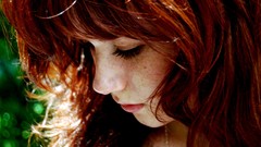 Woman faces closed eyes freckles redheads