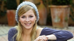 Woman faces earrings smiling models nail polish