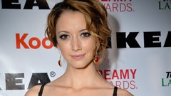 Woman faces earrings Taryn Southern