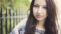 Woman faces fences blue eyes brunettes portraits